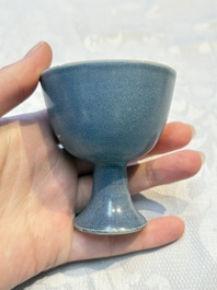 Four Chinese blue-glazed 'Hatcher Cargo' stem cups, Transitional period