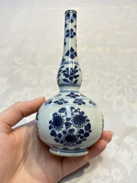 A Chinese blue and white covered ewer, a rose water sprinkler, a covered cup and saucer, jade 玉 and twin-fish mark, Kangxi