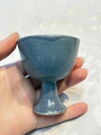 Four Chinese blue-glazed 'Hatcher Cargo' stem cups, Transitional period