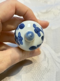 A Chinese blue and white ewer and cover with floral design, Kangxi