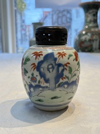 A Chinese famille rose 'Peony' jar and a 'Rooster' brush pot, Tongzhi mark, 18/19th C.