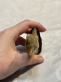 A Chinese carved mother-of-pearl figure of an official on wooden stand, 18/19th C.