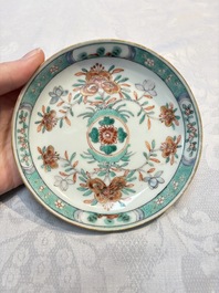 Five Chinese famille verte cups and saucers with floral design, 19th C.