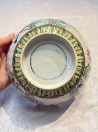 A Chinese blue and white bowl with floral design and a famille verte bowl, Kangxi