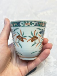 Five Chinese famille verte cups and saucers with floral design, 19th C.