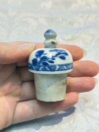 A Chinese blue and white ewer and cover with floral design, Kangxi