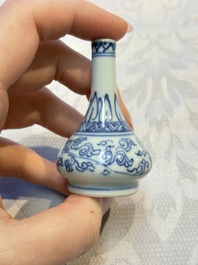 A group of 12 Chinese blue and white miniature vases and a small bottle vase, Kangxi