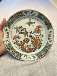 A pair of Chinese famille verte 'Birds Among Flowering Branches' plates, Kangxi