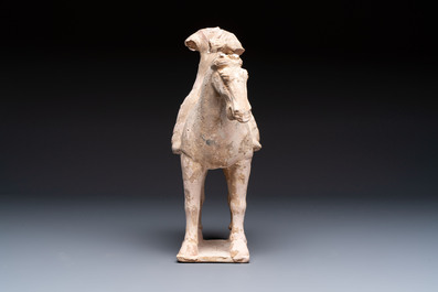 Three Chinese polychrome pottery figures, Sui/Ming