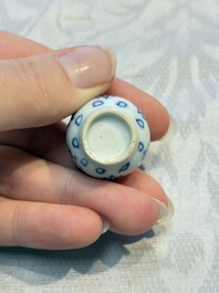 A group of 12 Chinese blue and white miniature vases and a small bottle vase, Kangxi