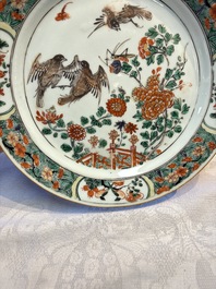 A pair of Chinese famille verte 'Birds Among Flowering Branches' plates, Kangxi