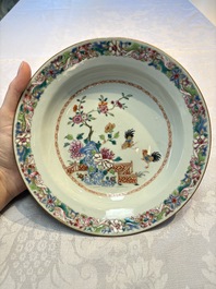 Four Chinese famille rose 'Roosters' plates and a 'Crane' dish, Qianlong