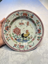 Four Chinese famille rose 'Roosters' plates and a 'Crane' dish, Qianlong