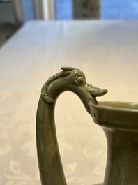 A fine Chinese Yueyao green-glazed chicken-head ewer with dragon-form handle, Southern Dynasties