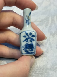 A group of 12 Chinese blue and white miniature vases and a small bottle vase, Kangxi
