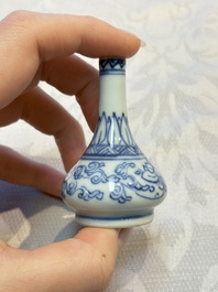 A group of 12 Chinese blue and white miniature vases and a small bottle vase, Kangxi