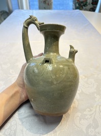A fine Chinese Yueyao green-glazed chicken-head ewer with dragon-form handle, Southern Dynasties