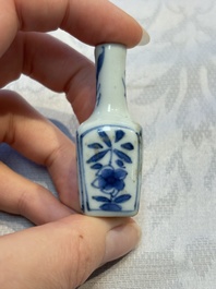 A group of 12 Chinese blue and white miniature vases and a small bottle vase, Kangxi