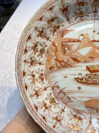 A Chinese iron-red and gilt-decorated 'Ode to the Red Cliff' dish, Kangxi