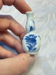 A group of 12 Chinese blue and white miniature vases and a small bottle vase, Kangxi