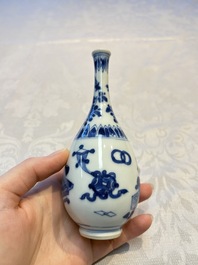 A group of 12 Chinese blue and white miniature vases and a small bottle vase, Kangxi