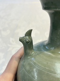 A fine Chinese Yueyao green-glazed chicken-head ewer with dragon-form handle, Southern Dynasties