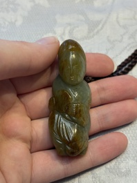 Four Chinese celadon and russet jade carvings, Qing