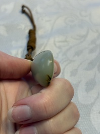 Four Chinese celadon and russet jade carvings, Qing