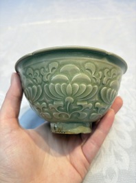 A Chinese carved Yaozhou celadon-glazed bowl with floral design, Jin