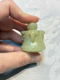 A Chinese celadon jade covered vase, with wooden stand, and a bowl with wooden cover and stand, 19/20th C.