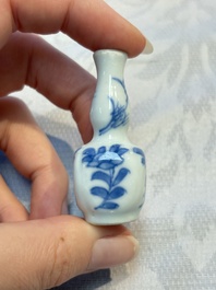 A group of 12 Chinese blue and white miniature vases and a small bottle vase, Kangxi