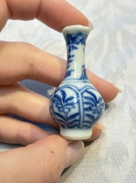 A group of 12 Chinese blue and white miniature vases and a small bottle vase, Kangxi