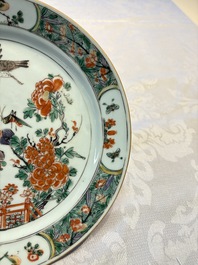 A pair of Chinese famille verte 'Birds Among Flowering Branches' plates, Kangxi