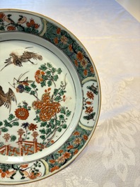 A pair of Chinese famille verte 'Birds Among Flowering Branches' plates, Kangxi