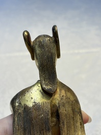 A Chinese gilt bronze figure of a birdman, probably Han