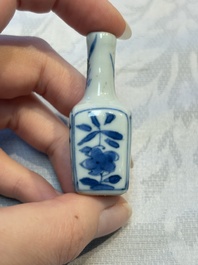A group of 12 Chinese blue and white miniature vases and a small bottle vase, Kangxi