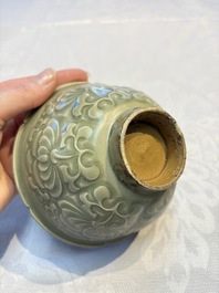 A Chinese carved Yaozhou celadon-glazed bowl with floral design, Jin