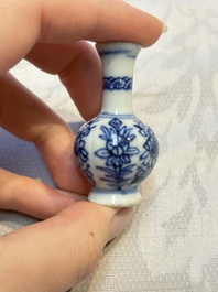 A group of 12 Chinese blue and white miniature vases and a small bottle vase, Kangxi