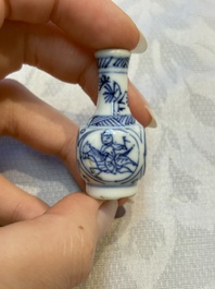 A group of 12 Chinese blue and white miniature vases and a small bottle vase, Kangxi