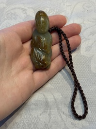 Four Chinese celadon and russet jade carvings, Qing