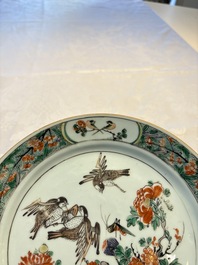 A pair of Chinese famille verte 'Birds Among Flowering Branches' plates, Kangxi