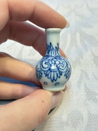 A group of 12 Chinese blue and white miniature vases and a small bottle vase, Kangxi