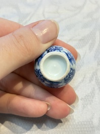 A group of 12 Chinese blue and white miniature vases and a small bottle vase, Kangxi
