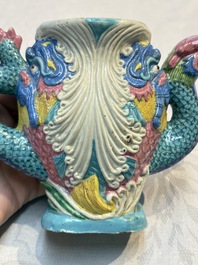 A Chinese famille rose ewer in the form of a dragon and two carps with wooden cover and stand, 19th C.