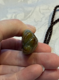 Four Chinese celadon and russet jade carvings, Qing