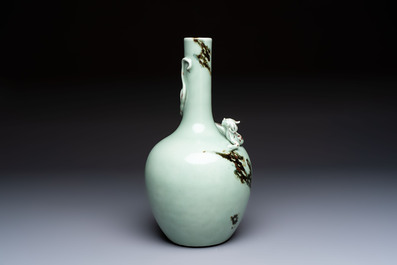 A Chinese 'Faux-Marble' celadon-ground vase with a copper-red-decorated chilong in relief, Qianlong mark and of the period