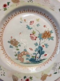 Four Chinese famille rose 'Roosters' plates and a 'Crane' dish, Qianlong