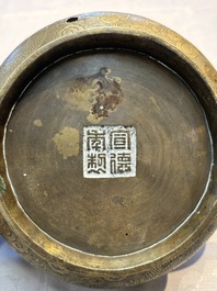 A Chinese bronze 'Dragon' censer, Xuande mark, 19th C.