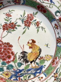 Four Chinese famille rose 'Roosters' plates and a 'Crane' dish, Qianlong