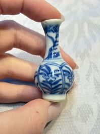 A group of 12 Chinese blue and white miniature vases and a small bottle vase, Kangxi